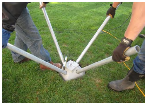 Figure 6. Setting Pins and Leveling Concrete Head